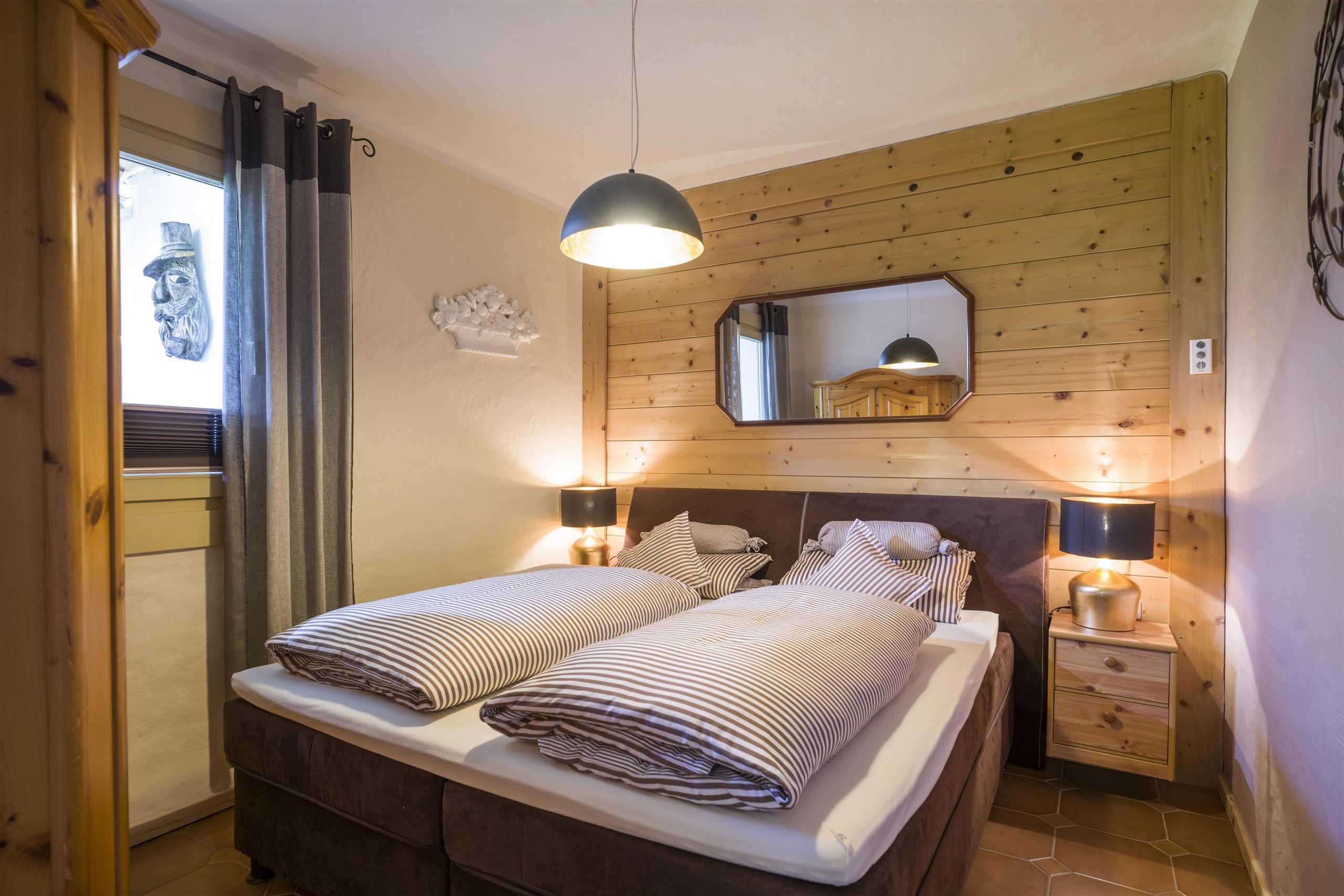 Schlafzimmer von Appartement "Maximilian" mit Doppelbett